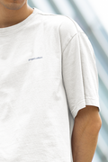 White t-shirt with gospel culture logo on a blurred background