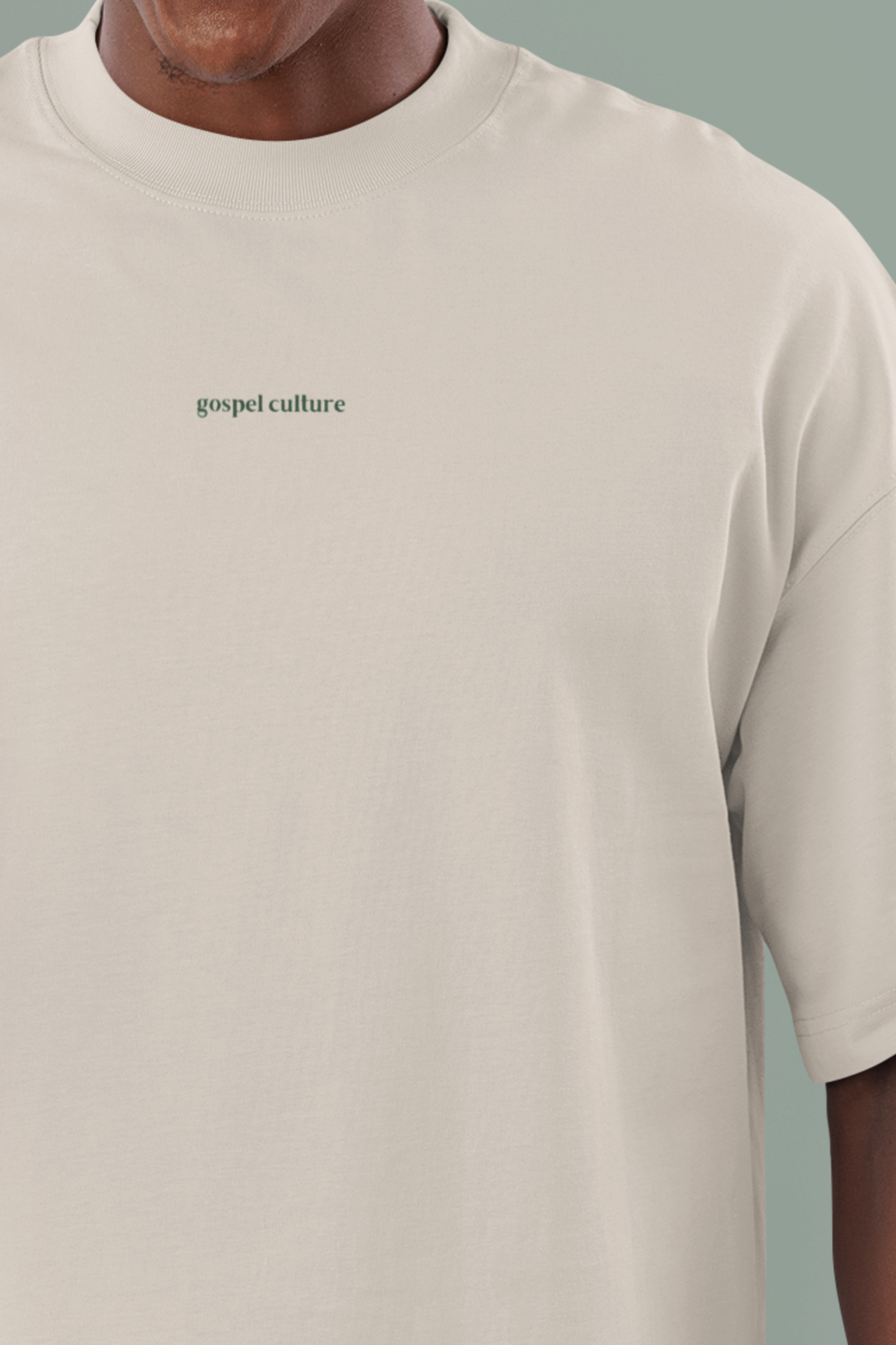 Beige t-shirt with 'gospel culture' text on a plain background