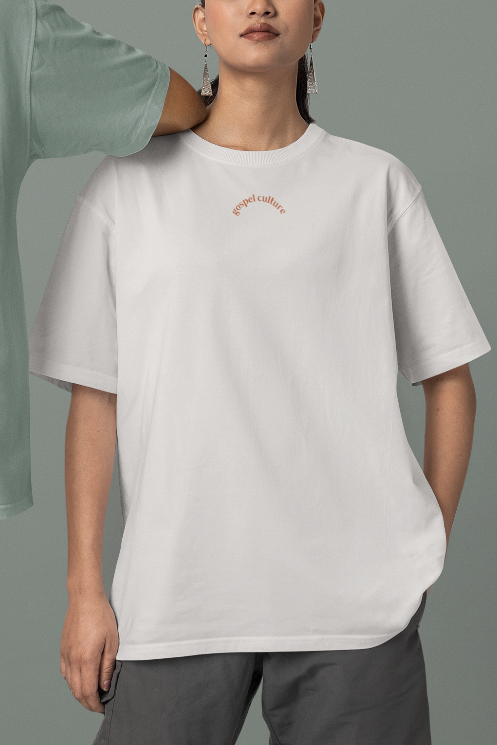 woman wearing off white oversized christian t shirt