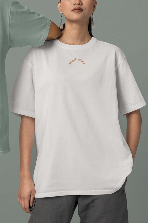 woman wearing off white oversized christian t shirt